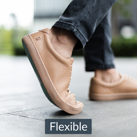 Flexible sole being bent by hand